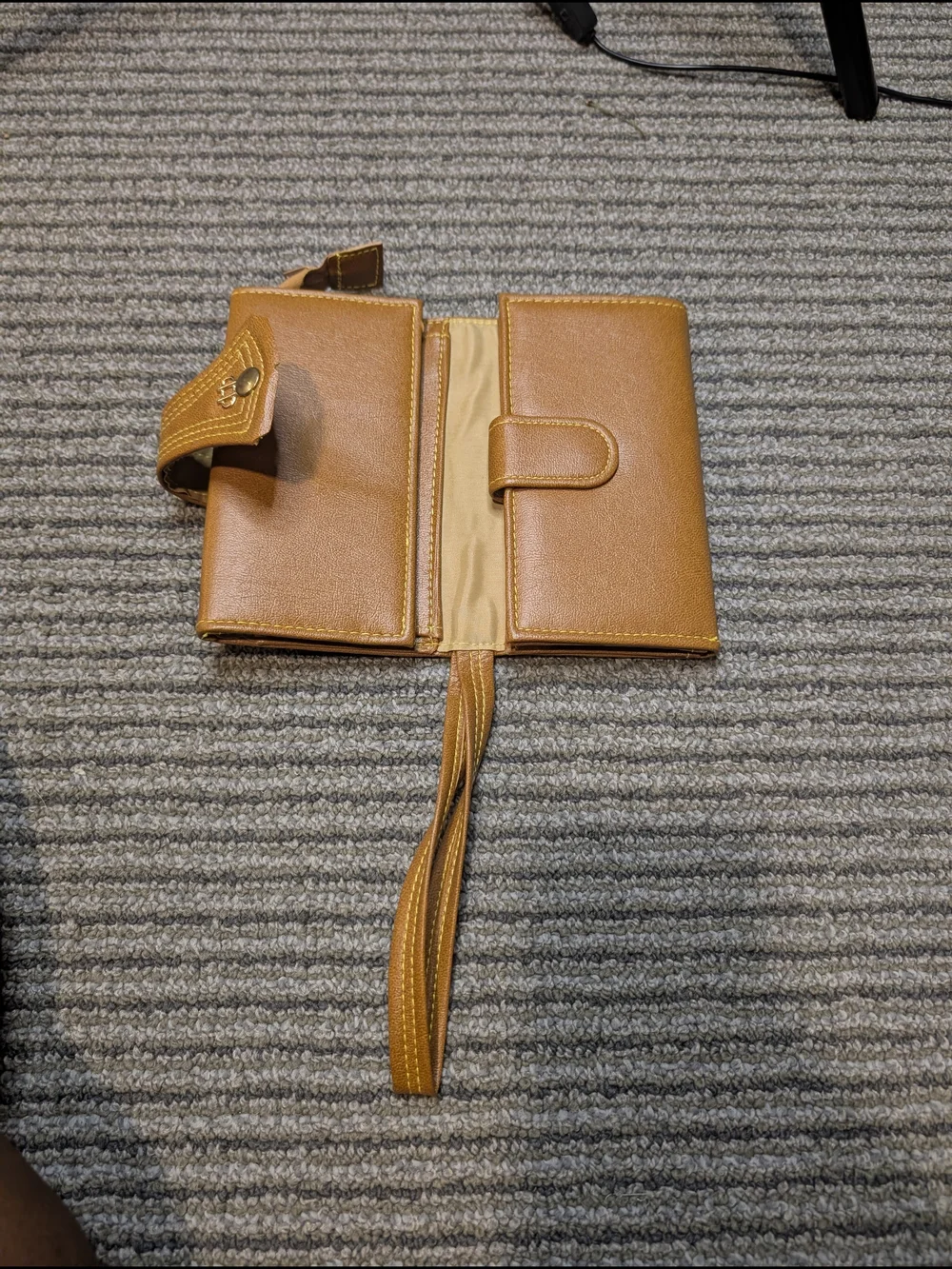 Vintage Tan Wristlet Wallet Rich cognac-tan wallet with wrist strap, snap closur